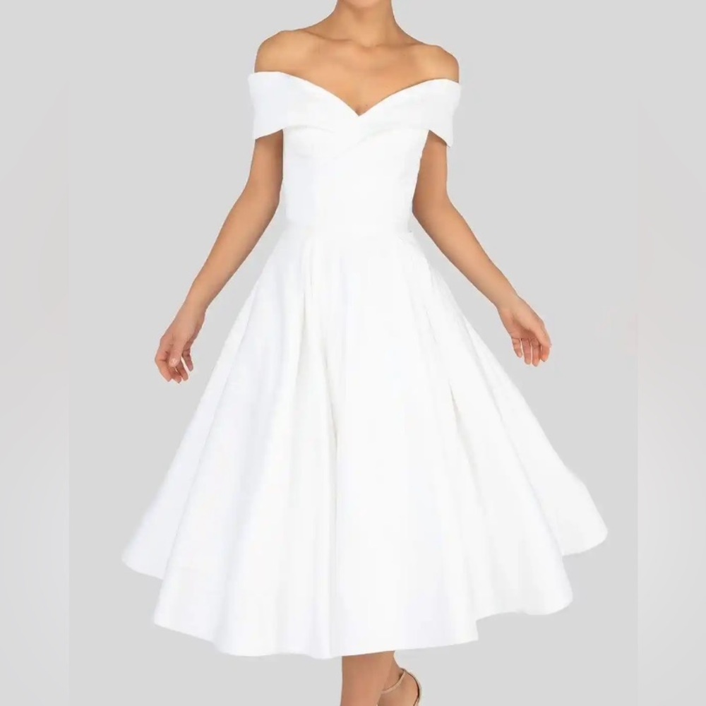 Wedding dress: Ivory, tea length, A-line, off the shoulder, size 10, worn once